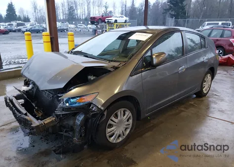 2011 Honda Insight from USA, damaged, VIN JHMZE2H32BS001076